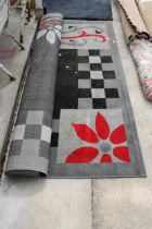 A MODERN GREY PATTERNED RUG