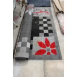 A MODERN GREY PATTERNED RUG