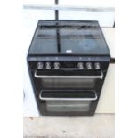 A BLACK NEW WORLD ELECTRIC OVEN AND HOB