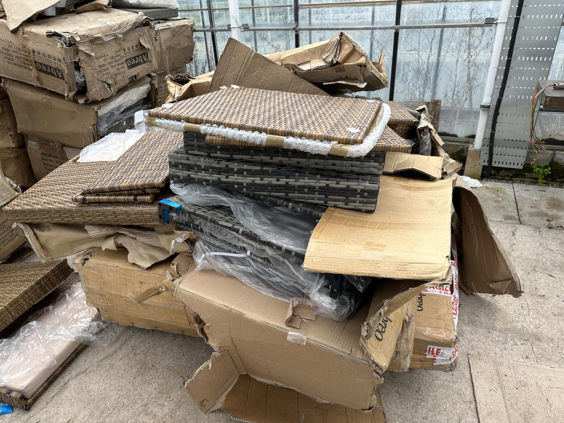 A PALLET OF BOXED GARDEN FURNITURE - BELIEVED UNUSED