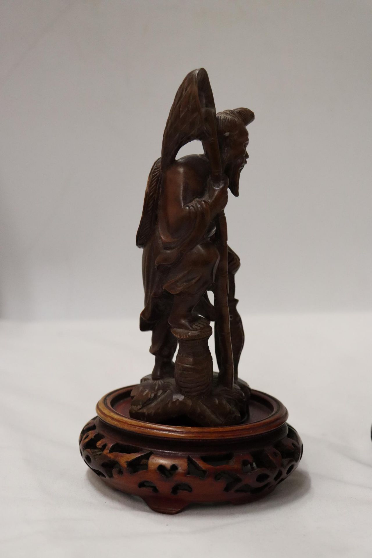 TWO CARVED WOODEN ORIENTAL FIGURES TO INCLUDE A LAUGHING BUDDAH, ON STANDS - Image 6 of 9