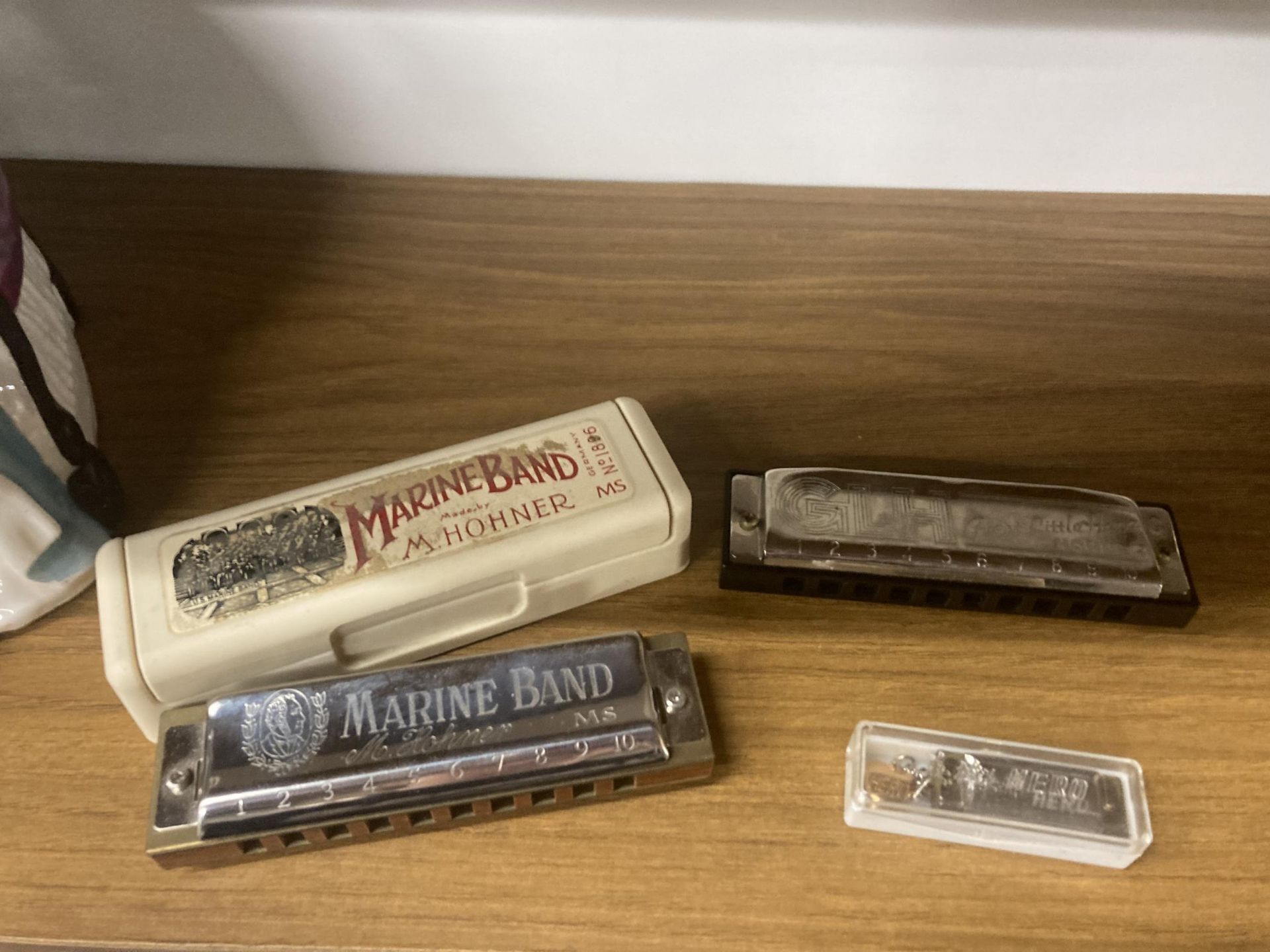 THREE HARMONICAS TO INCLUDE A HOHNER MARINE BAND NO. 1896, A HOHNER GREAT LITTLE HARP AND A HERO