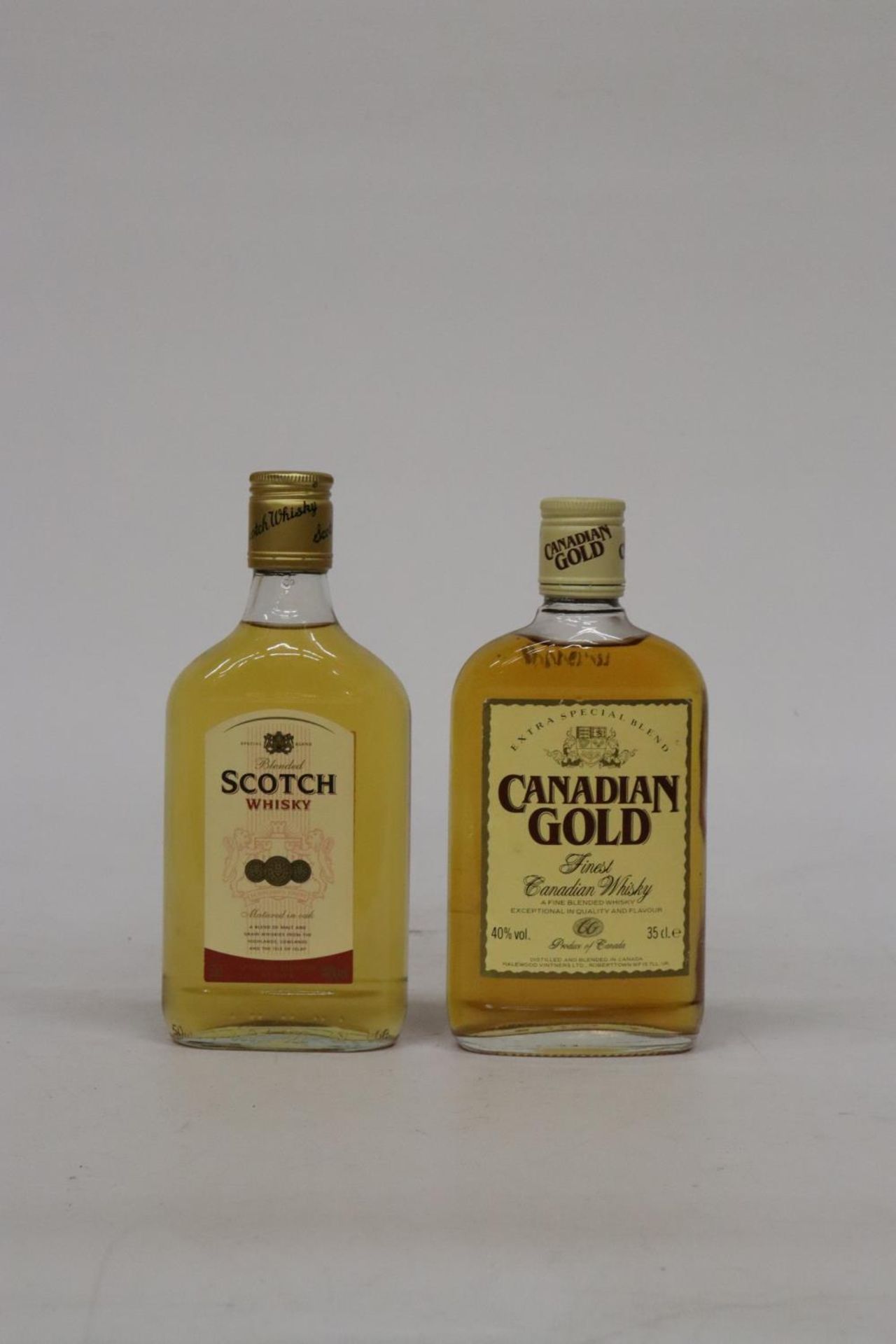 TWO 35CL BOTTLES OF WHISKY TO INCLUDE A SCOTCH AND A CANADIAN GOLD