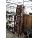 A VINTAGE WOODEN SIX RUNG STEP LADDER AND A VINTAGE WOODEN 5 RUNG STEP LADDER