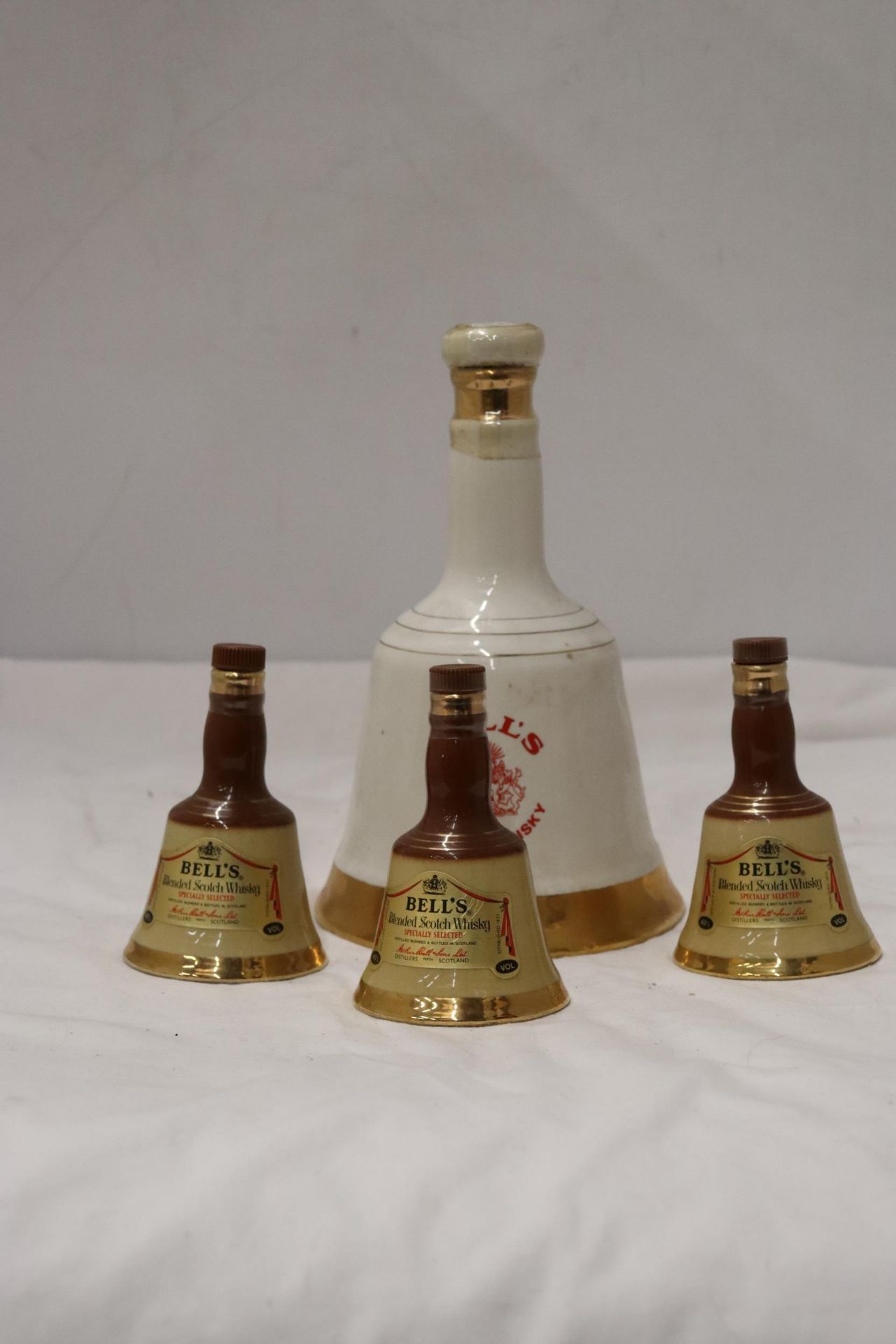 ONE LARGE AND THREE SMALL, BELL'S WHISKY CERAMIC DECANTERS - Image 2 of 8