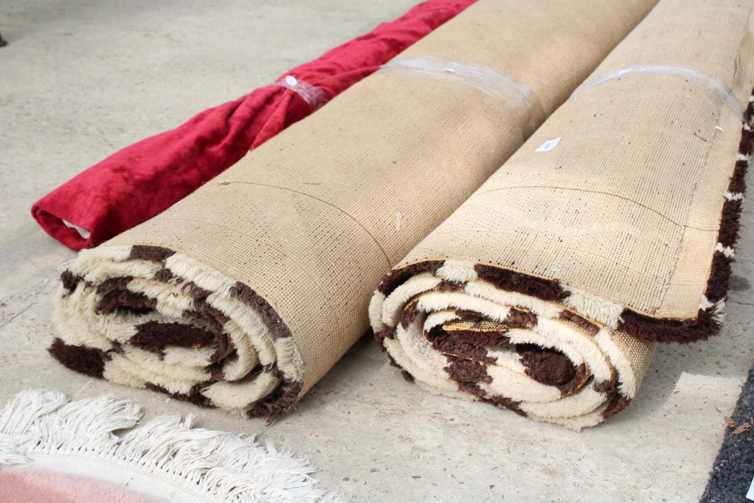 TWO LARGE BROWN PATTERNED RUGS AND A ROLL OF MATERIAL - Image 3 of 3
