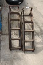 A PAIR OF METAL CAR RAMPS