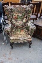 A PARKER KNOLL STYLE WINGED CHAIR
