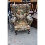 A PARKER KNOLL STYLE WINGED CHAIR