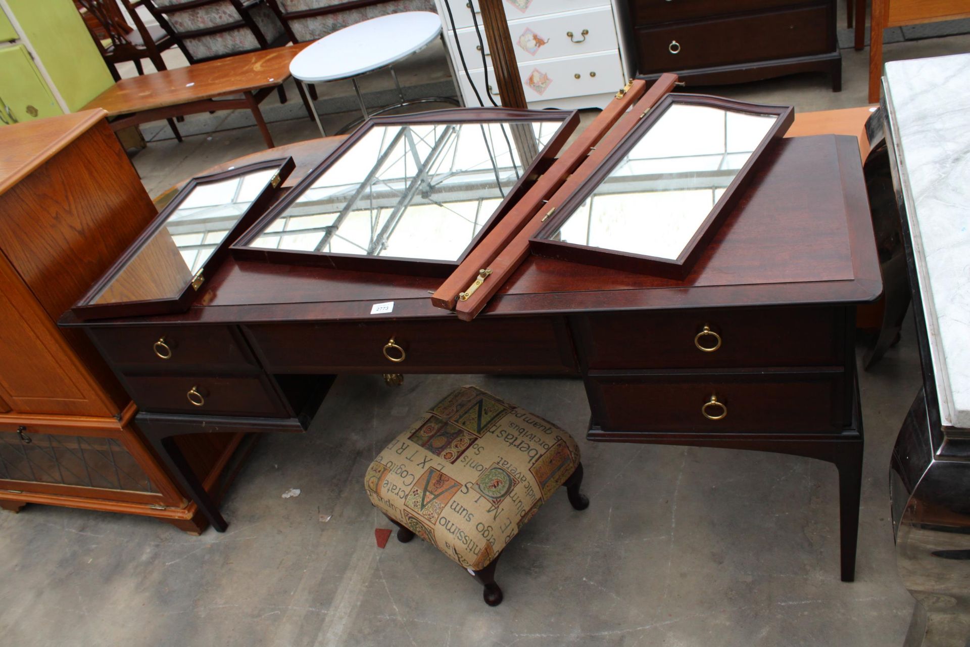 A STAG MINSTREL DRESSING TABLE 60" WIDE AND A SMALL STOOL ON CABRIOLE LEGS