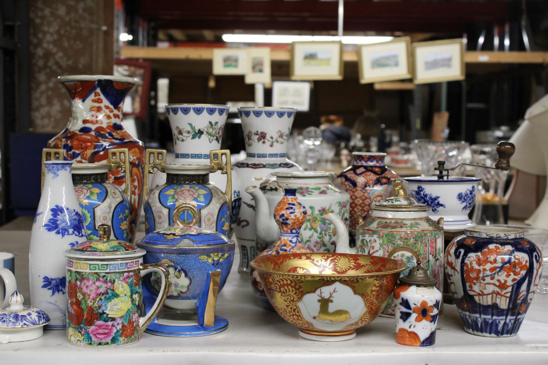 A LARGE QUANTITY OF CERAMICS TO INCLUDE ORIENTAL STYLE VASES AND TEAPOTS PLUS VINTAGE FRENCH
