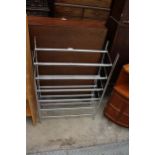 A MODERN POLISHED CHROME SIX TIER SHOE RACK, 25" WIDE