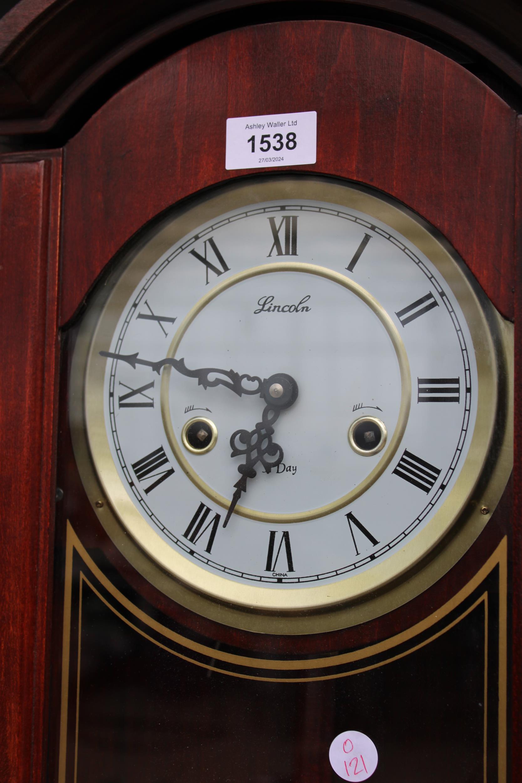 A WOODEN CASED CHIMING 31 DAY WALL CLOCK - Image 2 of 2