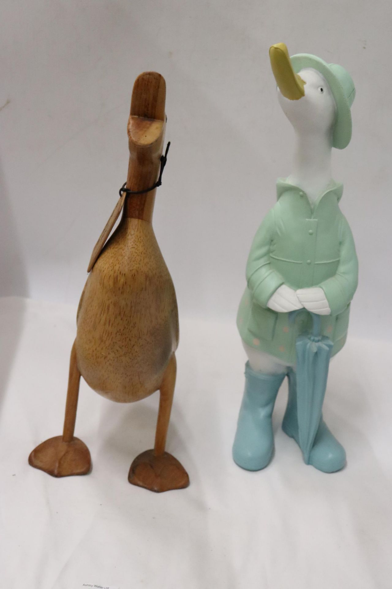 A WOODEN DUCK FROM 'THE DUCK COMPANY' CALLED FRED PLUS A PAINTED DUCK, HEIGHTS 42CM