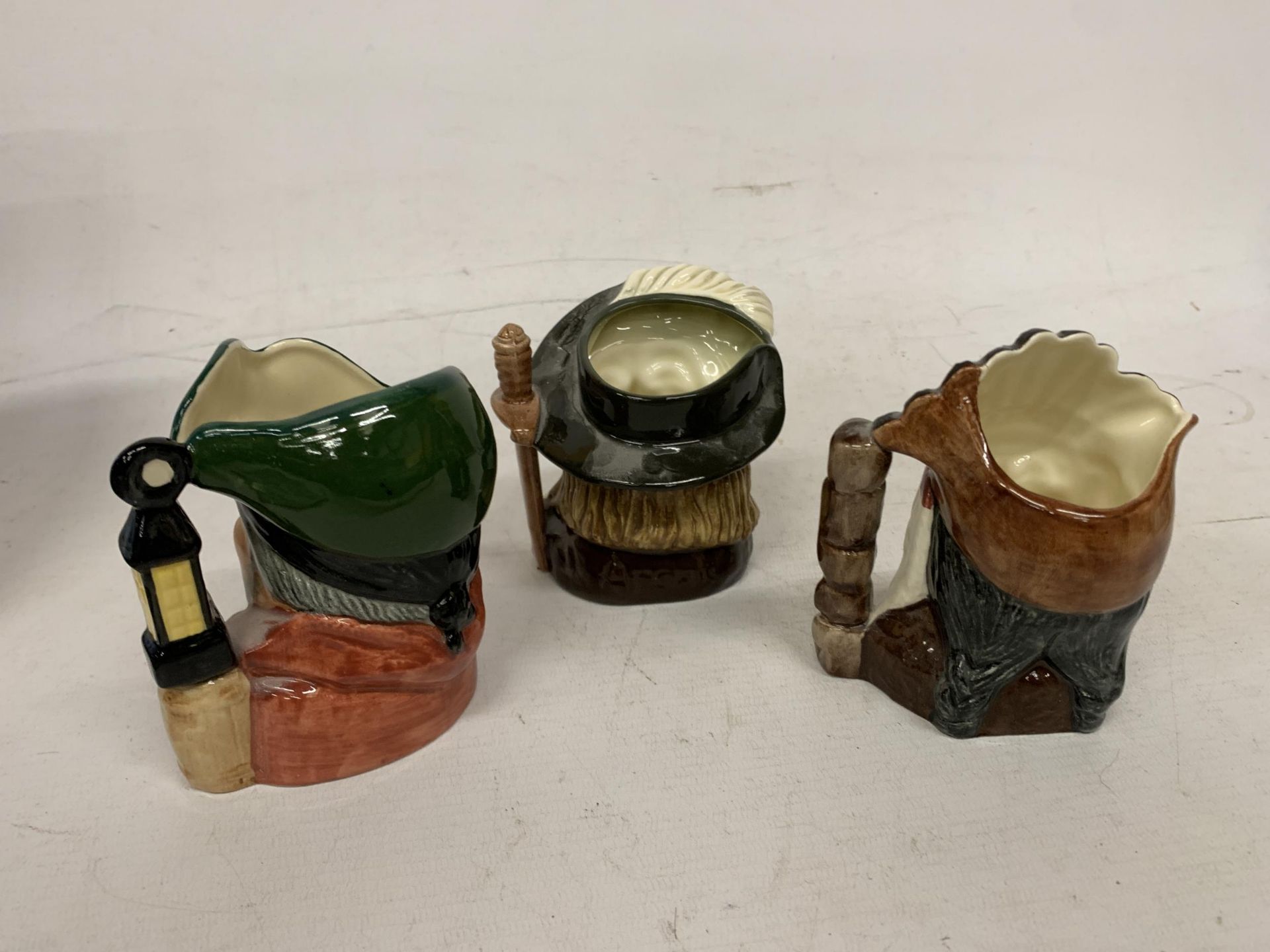 THREE ROYAL DOULTON TOBY JUGS TO INCLUDE THE SMUGGLER,NORTH AMERICAN INDIAN AND ARAMIS - Image 2 of 3