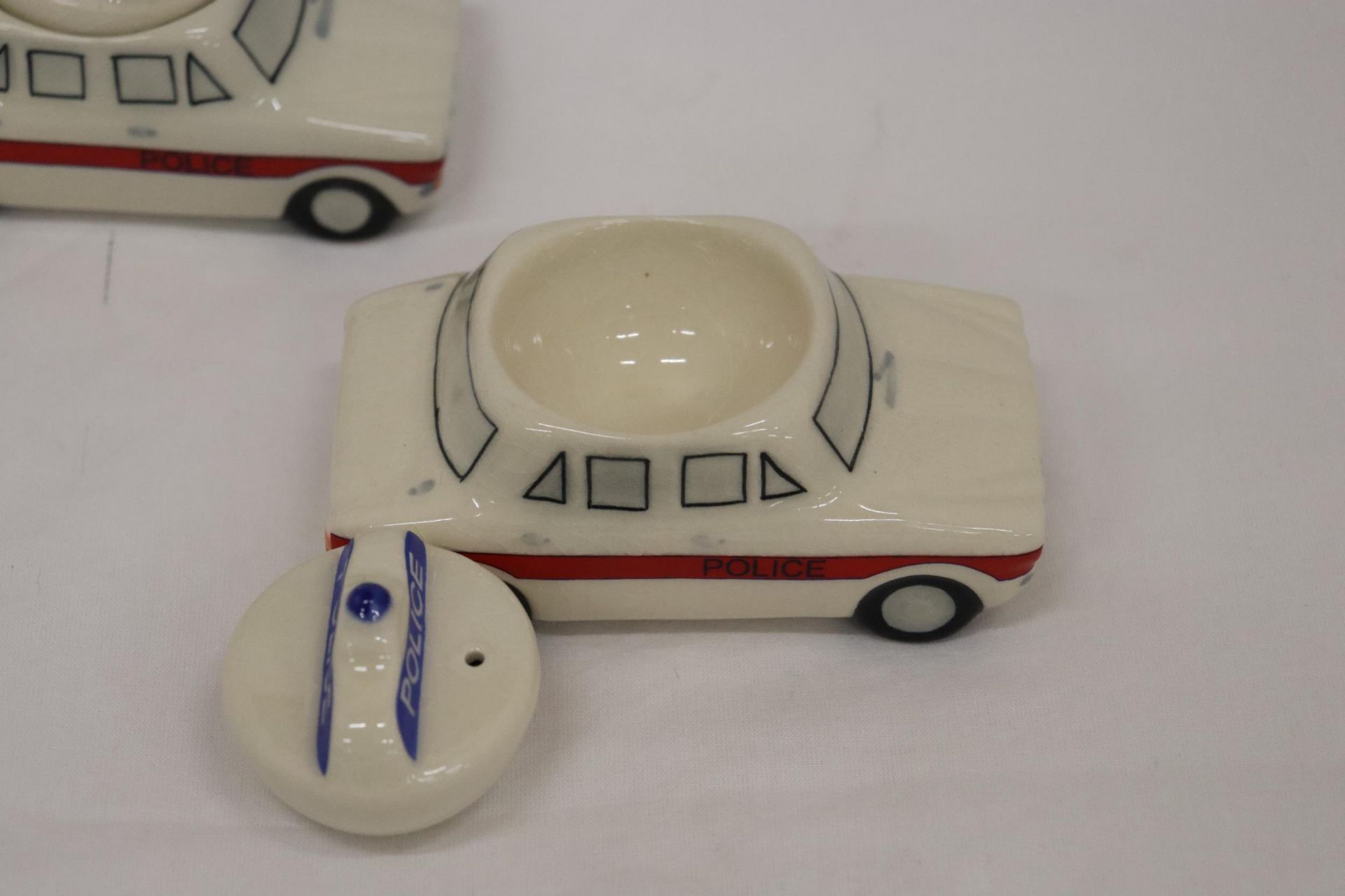 THIRTEEN POLICE CAR EGG CUPS WITH SALT POT FOR LID - Image 4 of 6