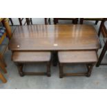 AN ELM ERCOL OLD COLONIAL STYLENEST OF THREE TABLES