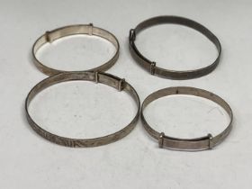 FOUR SILVER BABY BANGLES