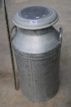 AN ALUMINIUM 'EXPRESS DAIRY' MILK CHURN WITH LID