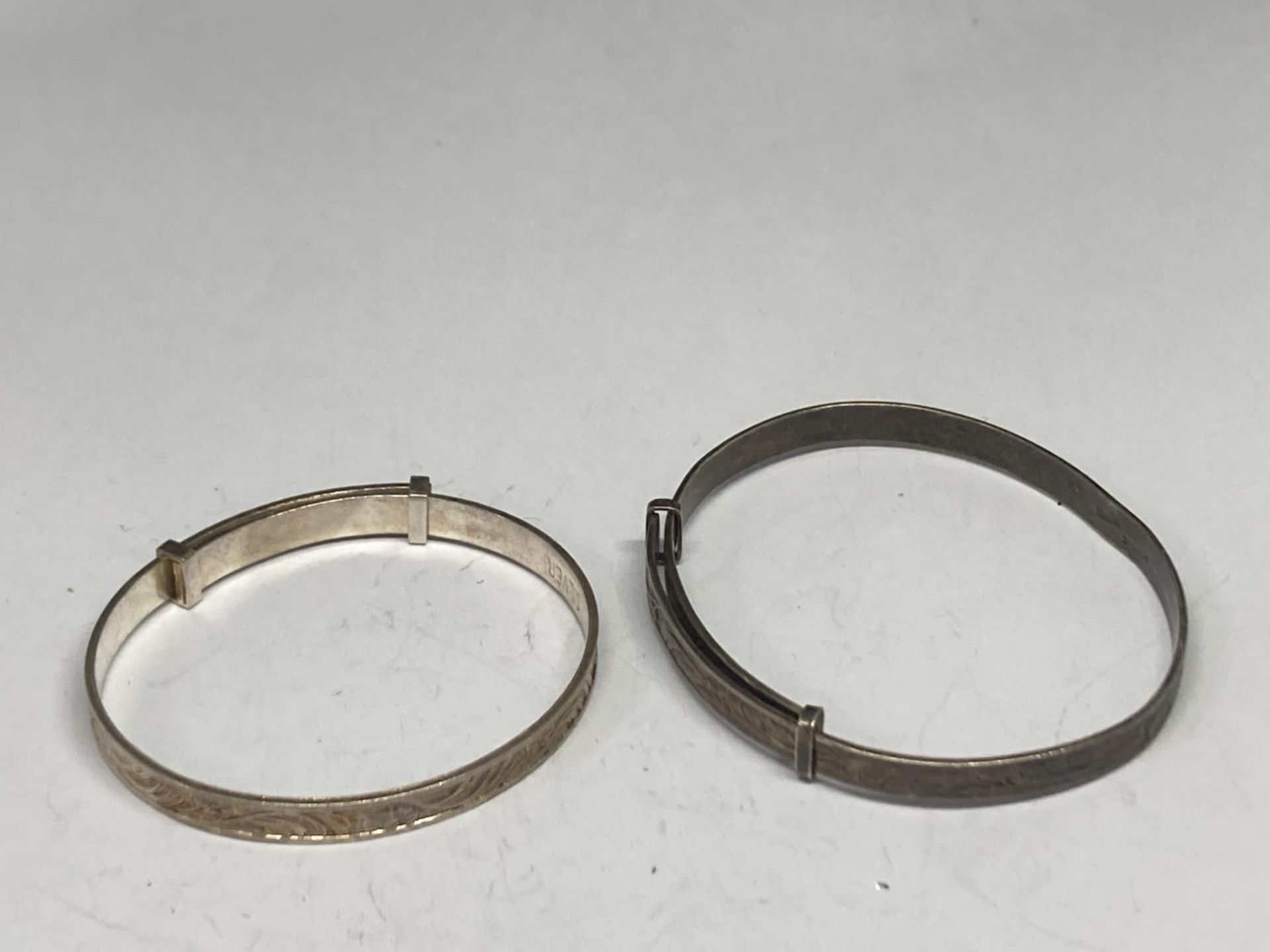 FOUR SILVER BABY BANGLES - Image 2 of 3