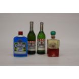TWO 50CL BOTTLES OF PERNOD FILS, A 37.5CL BOTTLE OF BLUE CURACAO AND A BOTTLE OF