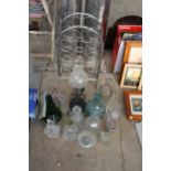 AN ASSORTMENT OF ITEMS TO INCLUDE A WINERACK, DECANTORS AND VASES ETC