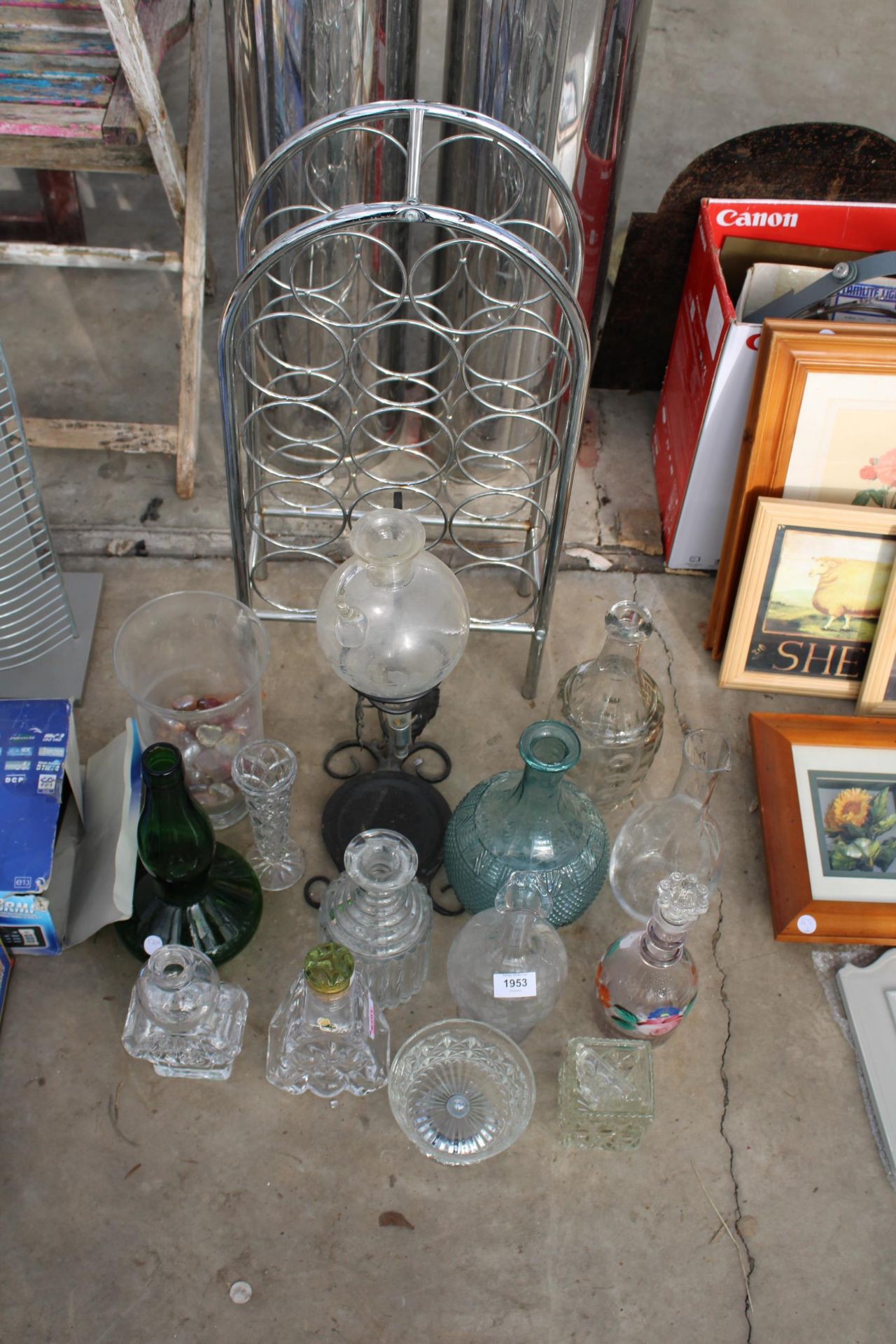 AN ASSORTMENT OF ITEMS TO INCLUDE A WINERACK, DECANTORS AND VASES ETC