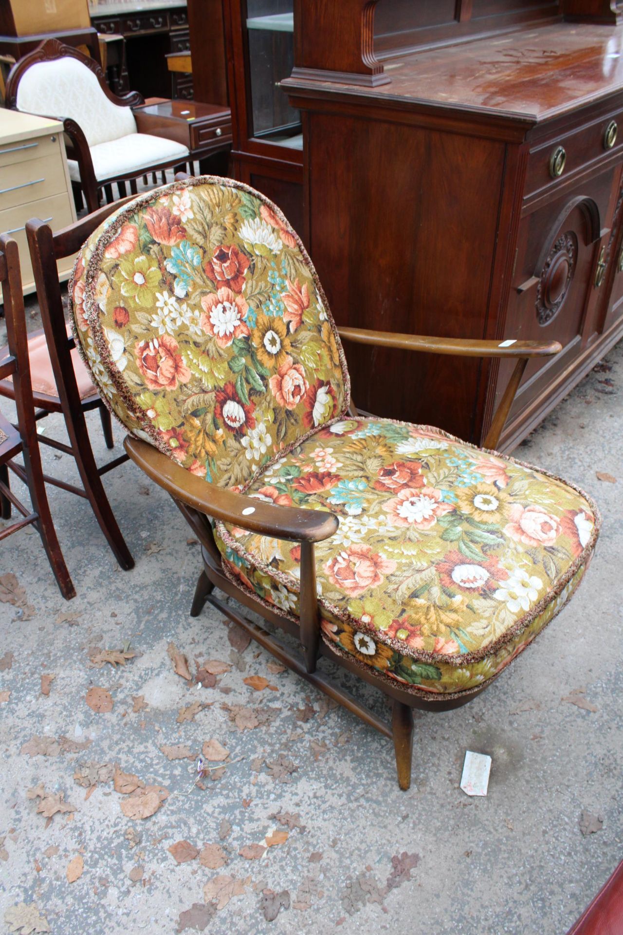 AN ERCOL BLUE LABEL FIRESIDE CHAIR