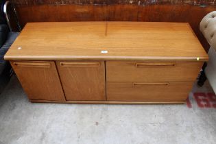 A RETRO TEAK SIDEBOARD BY MEREDEW ENCLOSING TWO CUPBOARDS AND TWO DRAWERS