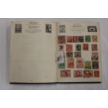 A STAMP ALBUM CONTAINING STAMPS FROM AROUND THE WORLD