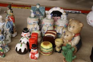 A COLLECTION OF NOVELTY CRUET SETS AND STORAGE JARS