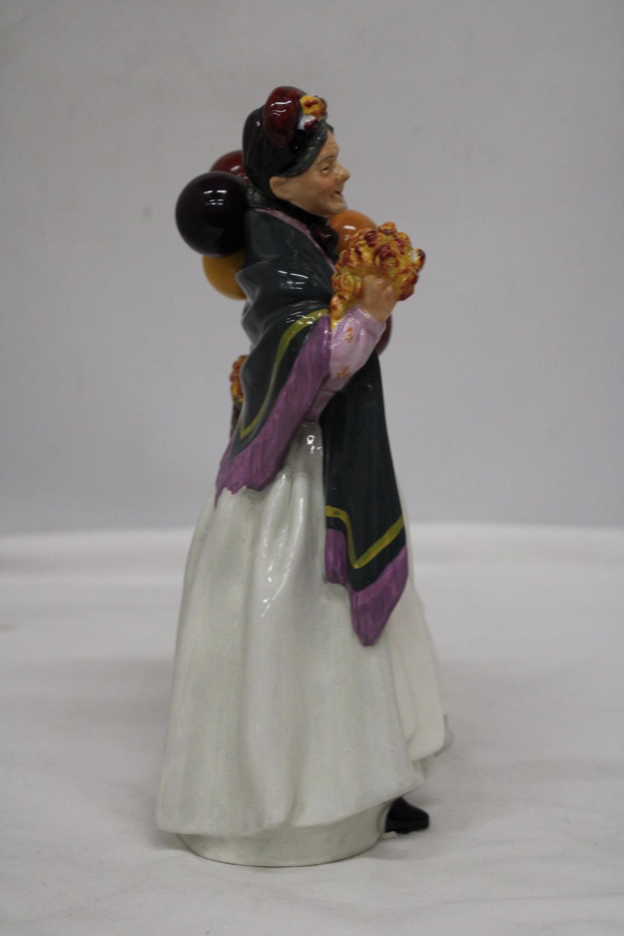 A ROYAL DOULTON FIGURE " BIDDY PENNY FARTHING" HN 1843 - Image 3 of 6