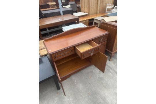 A CHERRY WOOD SIDEBOARD