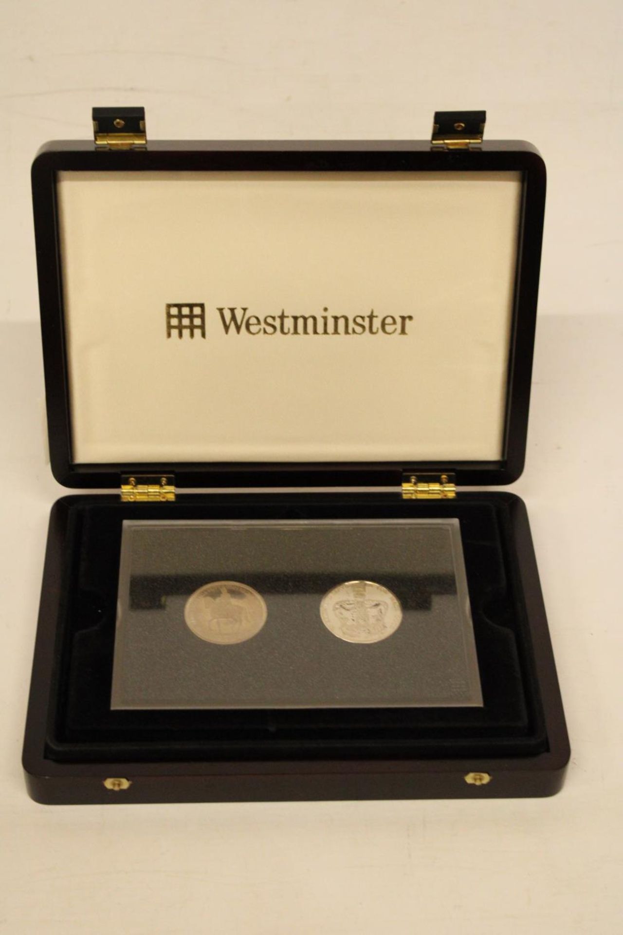 A WESTMINSTER COLLECTION OF COINS TO INCLUDE A QUEEN ELIZABETH II CORONATION CROWN FIVE SHILLINGS