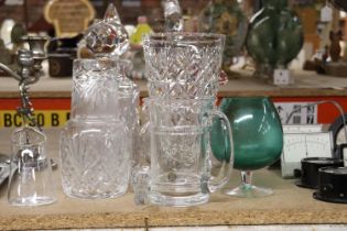 A QUANTITY OF GLASSWARE TO INCLUDE DECANTERS, VASE, TANKARD, ETC.,