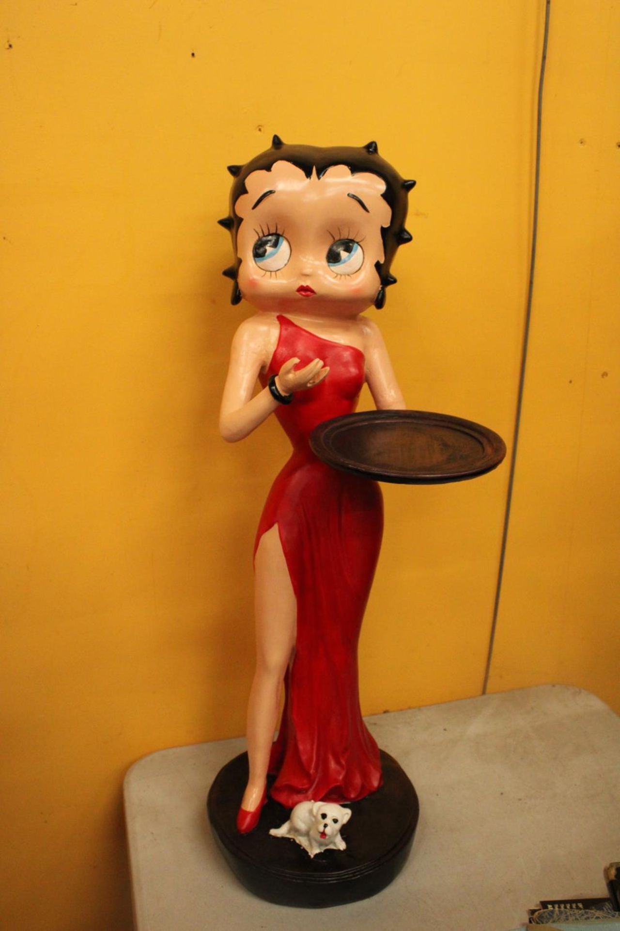 A DUMB WAITER IN THE STYLE OF A BETTY BOO WAITRESS FIGURE