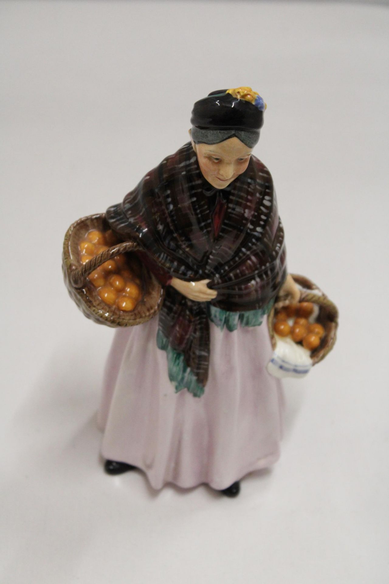 A ROYAL DOULTON FIGURE "THE ORANGE LADY" HN 1759