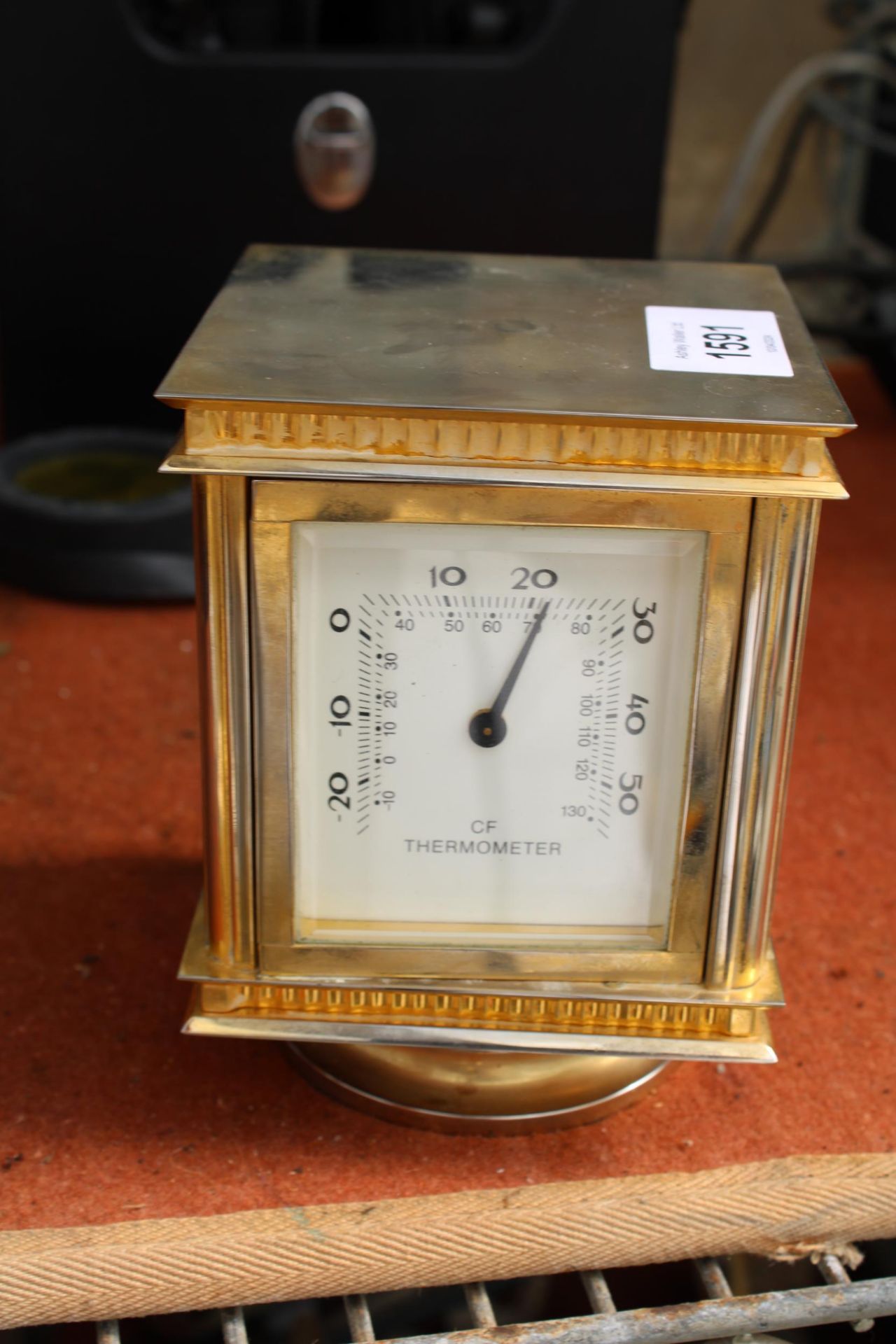 A BRASS JENS OLSEN REVOLVING DESK CLOCK WITH FOUR FACES, TWO BEING CLOCKS, ONE THERMOMETER AND ONE - Image 2 of 6