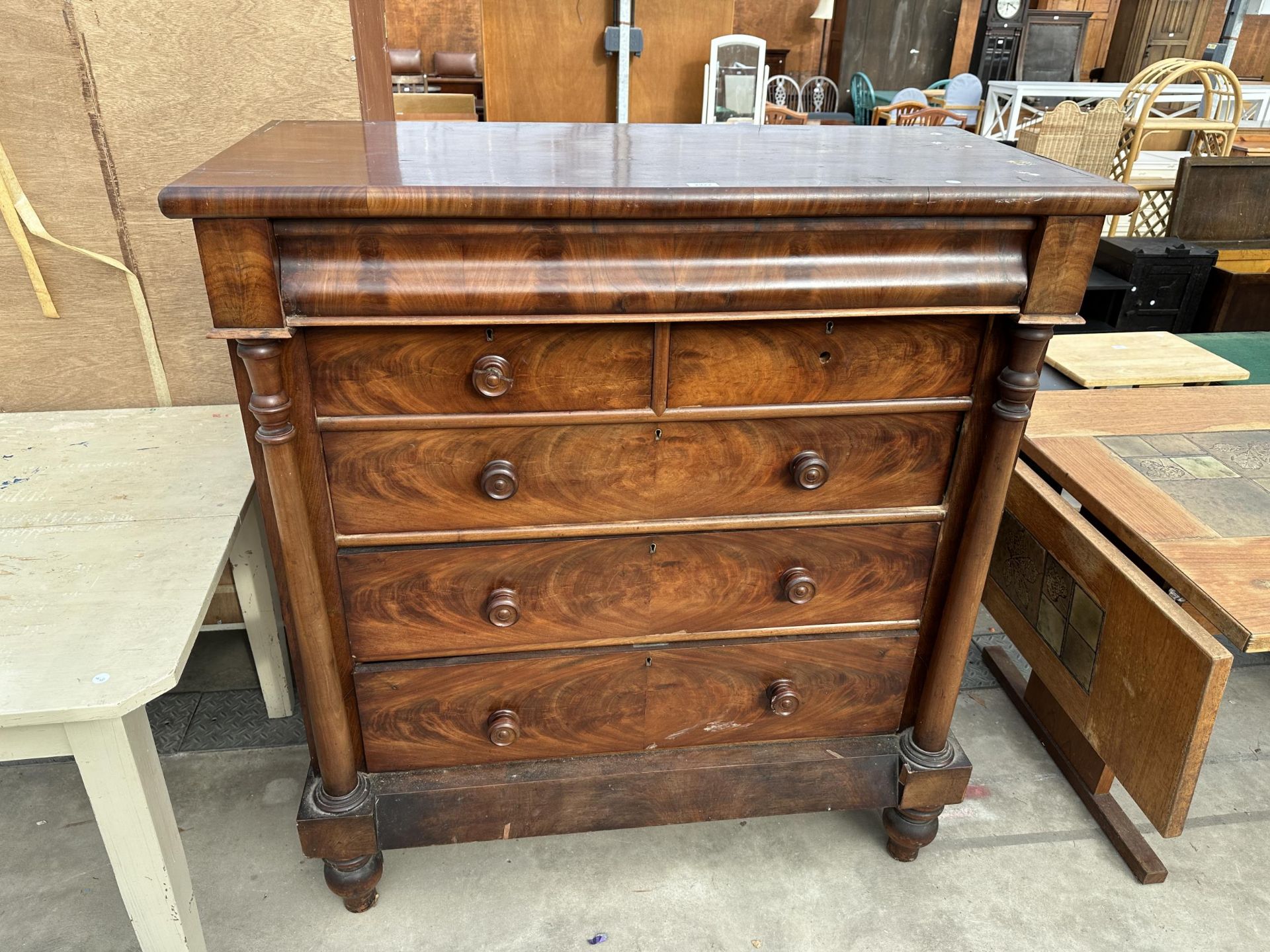 A VICTORIAN MAHOGANY SCOTTISH CHEST OF TWO SHORT, THREE LONG GRADUATED DRAWERS AND SECRET FRIEZE