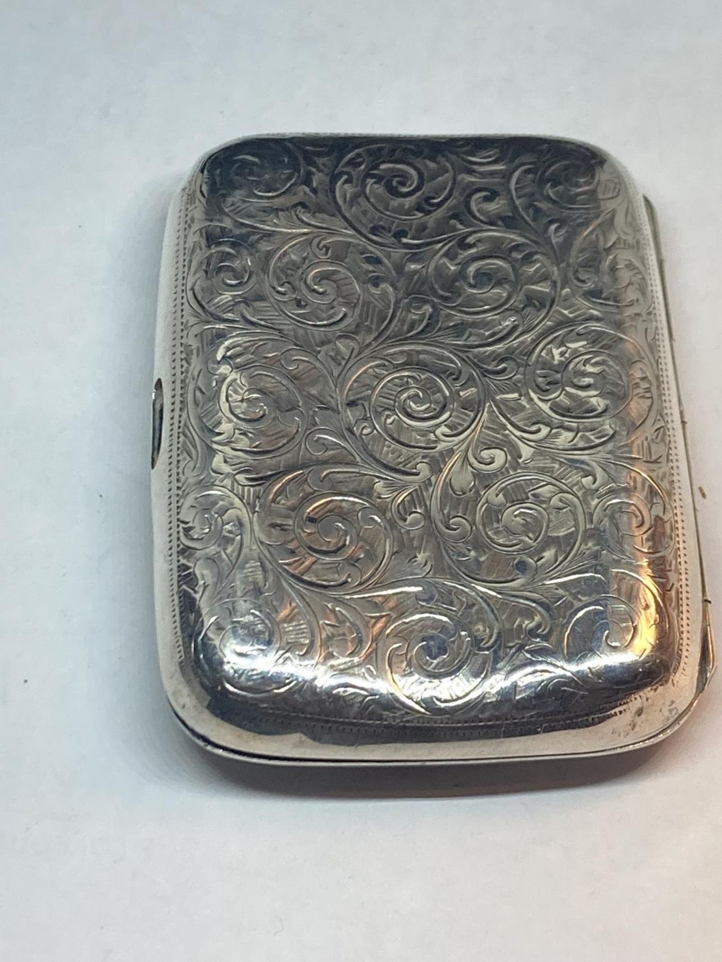 A HALLMARKED BIRMINGHAM SILVER CIGARETTE CASE GROSS WEIGHT 82.8 GRAMS