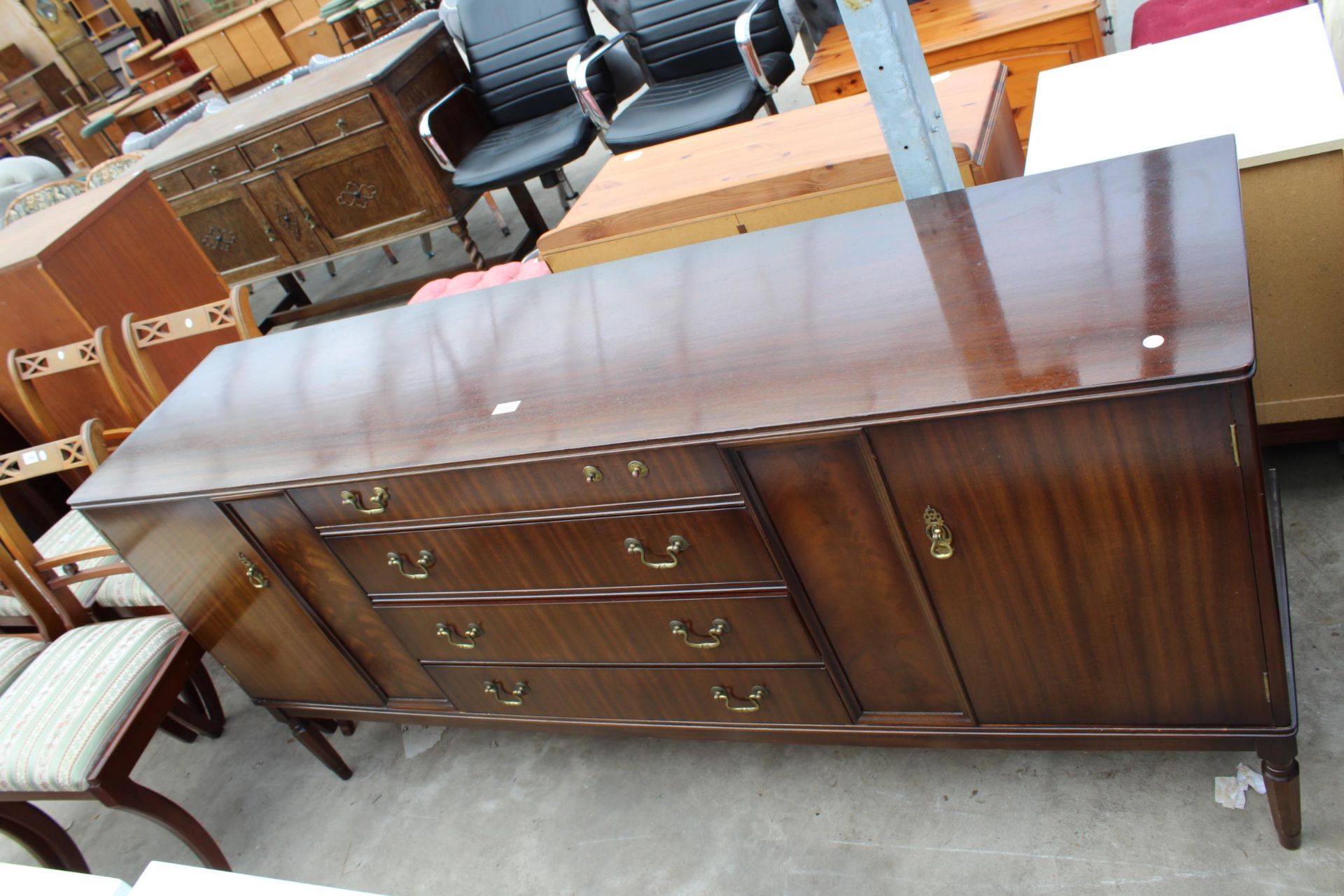 A MAHOGANY STRONGBOW FURNITURE SIDEBOARD ENCLOSING FOUR DRAWERS AND TWO CUPBOARDS, 72" WIDE