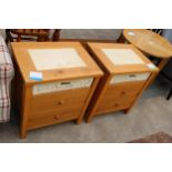 A PAIR OF PINE BEDSIDE CHESTS, BOTH WITH WICKER TOP DRAWERS AND INSET TOP