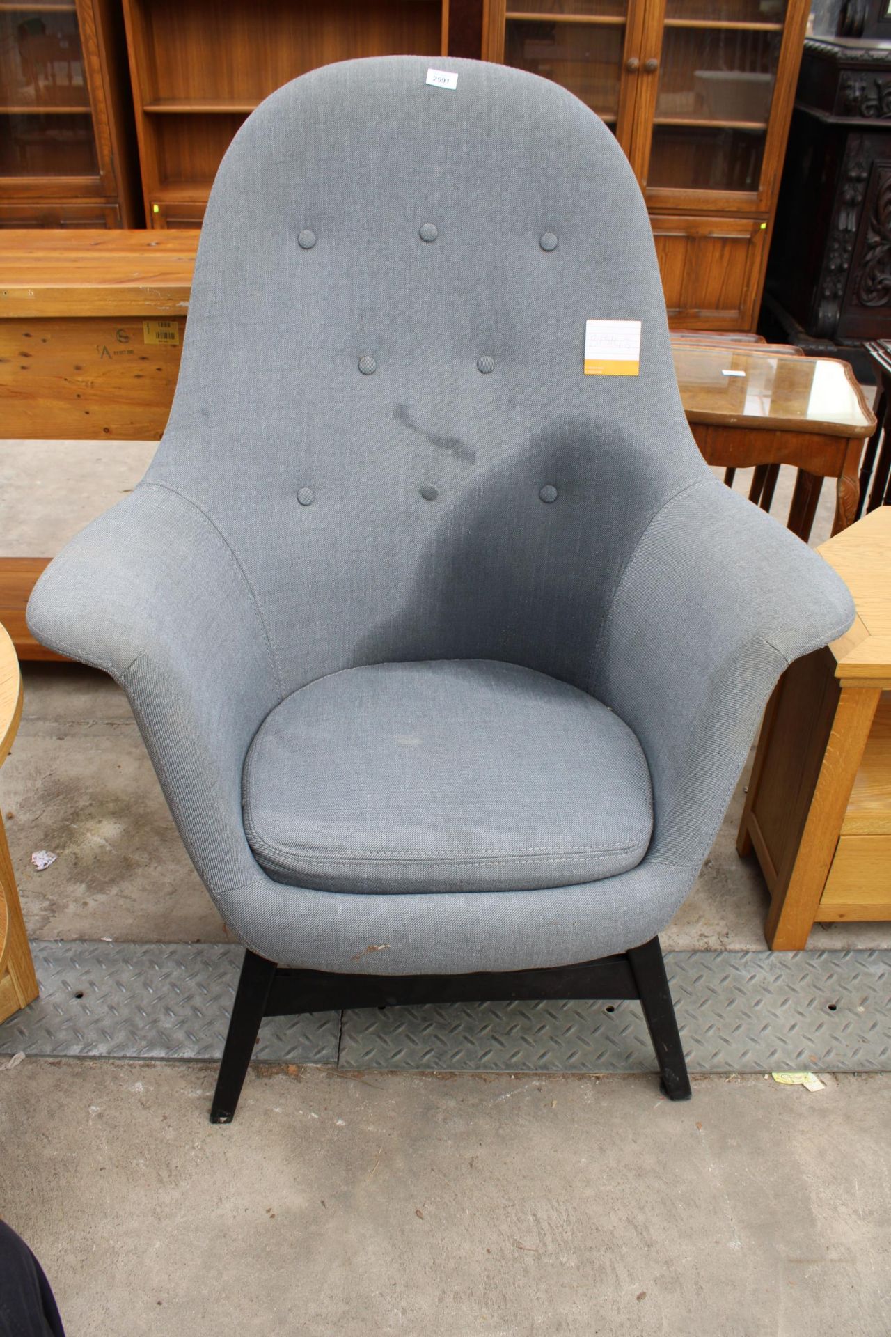 A GREY HIGH BUTTON-BACK IKEA STYLE EASY CHAIR ON BLACK PAINTED LEGS