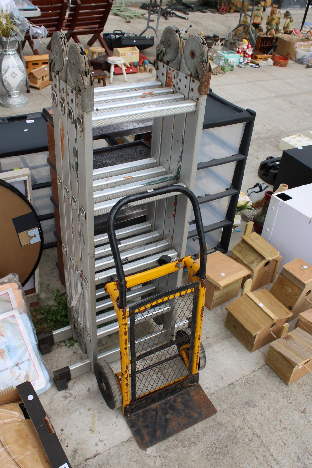 A MULTI FUNCTIONAL FOLDING ALUMINIUM LADDER AND A SACK TRUCK