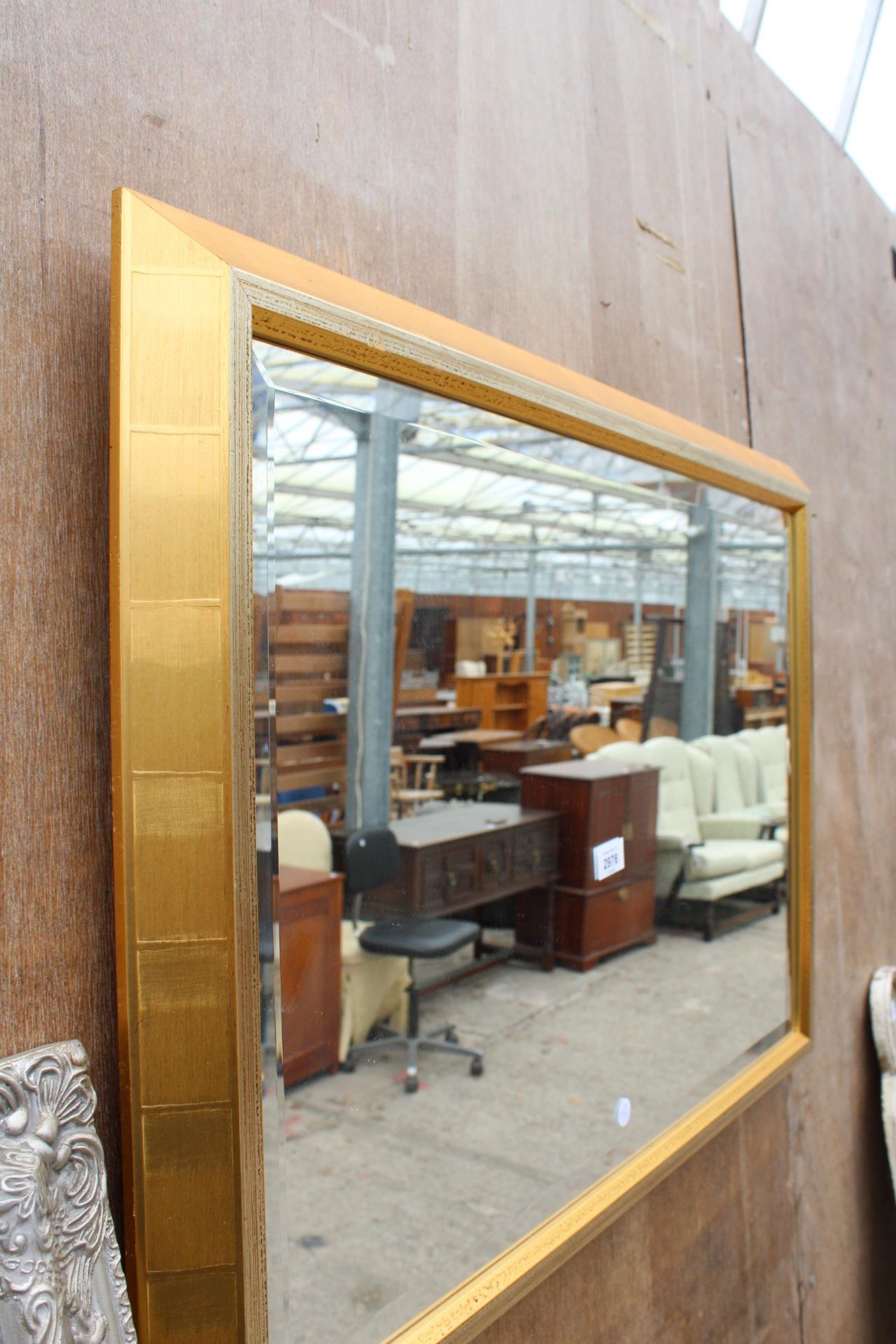 A MODERN GILT FRAMED BEVEL EDGE WALL MIRROR, 33" X 23" - Image 2 of 4