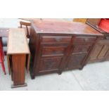 A LATE VICTORIAN SIDEBOARD AND OAK DROP LEAF DINING TABLE