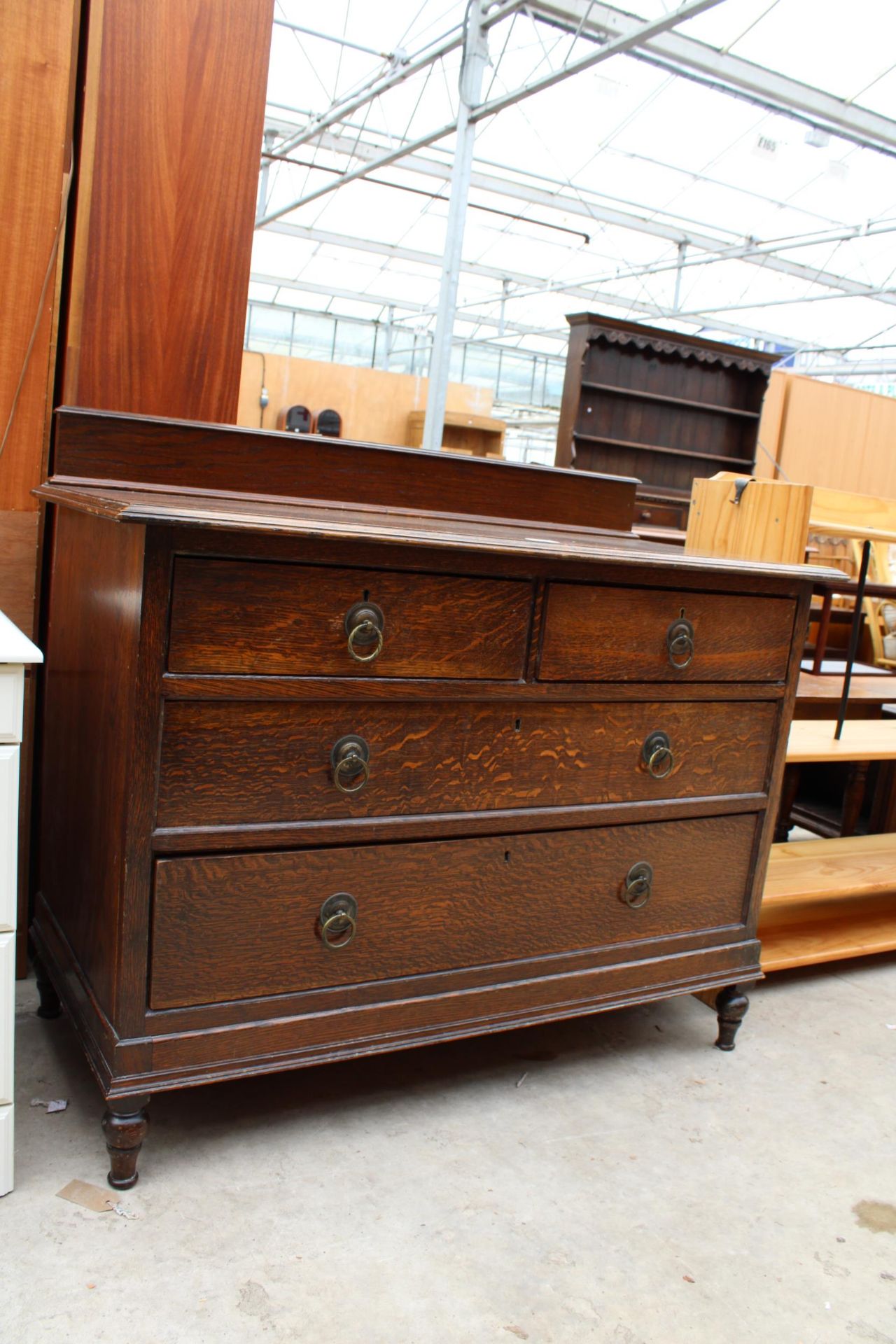 AN EARLY 20TH CENTURY OAK CHEST OF TWO SHORT AND TWO LONG DRAWERS 42" WIDE WITH HUNTER & CO - Image 2 of 4