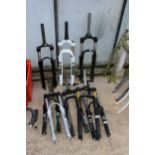 AN ASSORTMENT OF BIKE FRONT FORKS WITH SUSPENSION