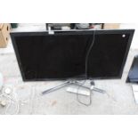 A SAMSUNG 40" TELEVISION WITH REMOTE CONTROL