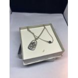 TWO SILVER NECKLACES IN A BOX